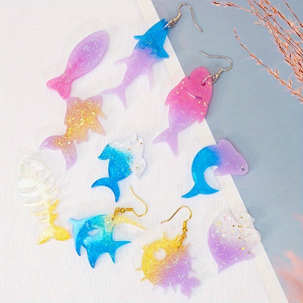 海をテーマにしたイヤリングとペンダントの型セットには、魚の尾 - Aquarium Marine のレビューと価格